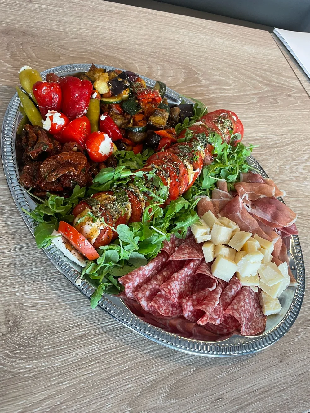 Antipasti platter with vegetables, cheese and Italian cured meats