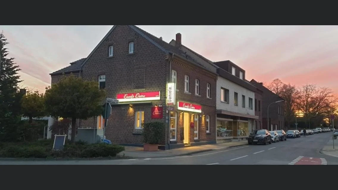 The gelateria lit up in the evening